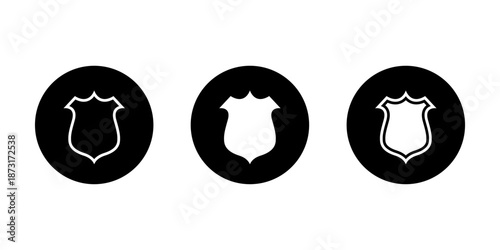 Shield badge icon set in black circle. Protection and security symbol