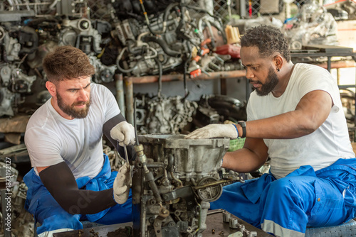 Slika na platnu auto two professional mechanical technician garage motor car engine team check automobile engine for diagnostic maintain transmission machine
