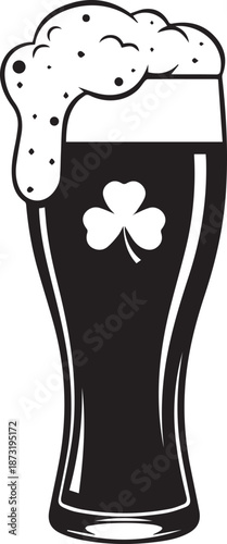 St patricks day pint of dark beer with shamrock