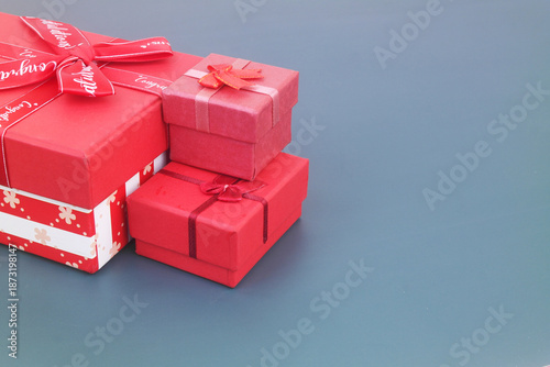 Obraz na plátně Gift boxes on blue background. Birthday and resent concept.