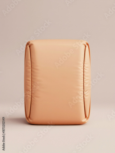 Peach colored cushion on white background