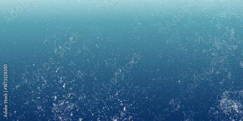 Abstract dotted halftone texture fading from white to teal and deep blue in vertical gradient. Eps 10