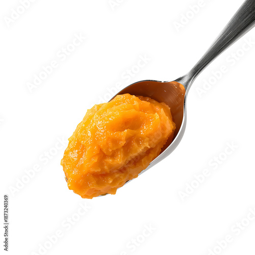 Spoonful of Mashed Sweet Potato on a Silver Spoon Ready for Serving