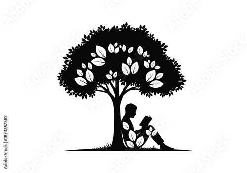 Serene woman engrossed in reading book under tree silhouette