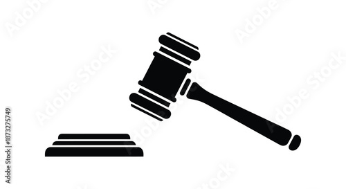 A striking black silhouette of a gavel resting atop a sound block silhouette