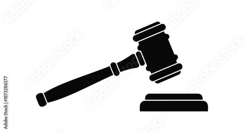 A black silhouette of a traditional gavel and sounding block representing law and justice silhouette