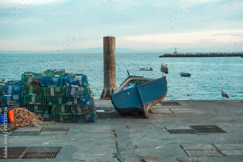 Traditional fishing boat in a pier in Cascais Portugal	