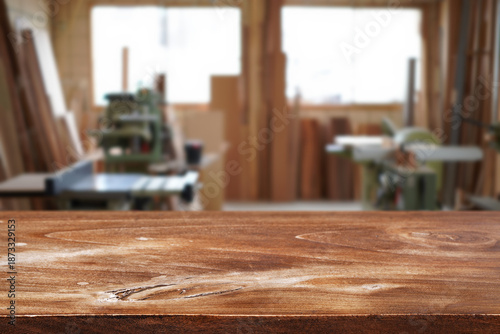 Foto Workshop is filled with various tools and equipment and wooden table on foregrou