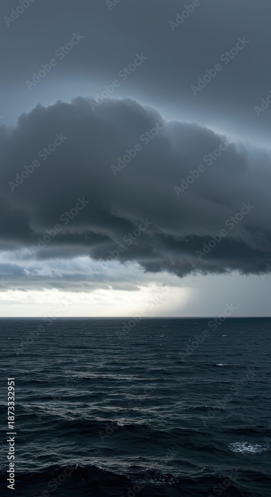 Obraz premium Stormy weather over the vast ocean where dark, heavy clouds merge with rough, churning water, illustrating climate dynamics and energy exchange, vast, nature, circulation