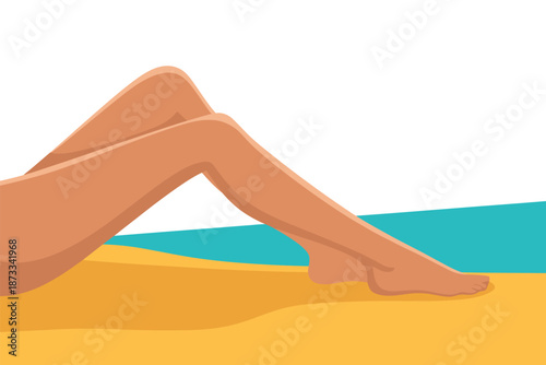 A woman's legs relaxing on a sandy beach by the ocean