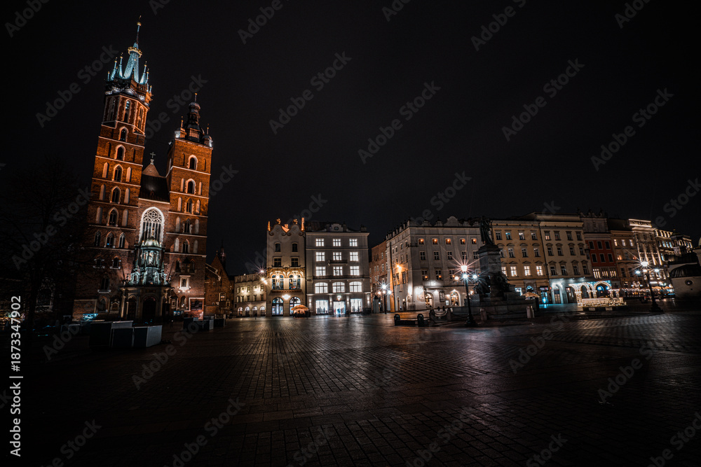 Naklejka premium Krakow Old Town Square at Night with St Marys Basilica. Poland.