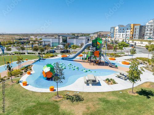Aerial view of residential community big playground with slices, swings in south San Diego, Chula Vista