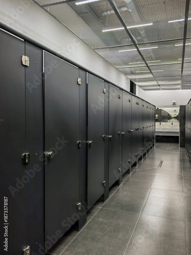 Modern Public Restroom with Closed Stall Doors