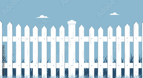 A classic white picket fence with green grass below and a clear blue sky with a few clouds above, creating an idyllic suburban scene.