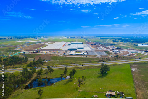 Photography Drone aerial photograph of the new logistics freight centre at the Western Sydney International Airport in the town of Badgerys Creek in New South Wales, Australia