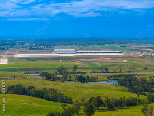Fotografia Drone aerial photograph of the new logistics freight centre at the Western Sydney International Airport in the town of Badgerys Creek in New South Wales, Australia