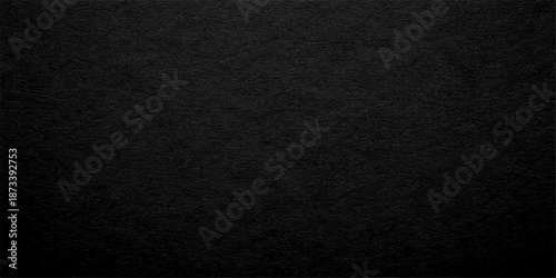 Rough black fabric and dark paper texture backgrounds feature a blank grunge material surface with a macro pattern on old charcoal grey canvas textile cloth