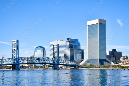 View of the Mainstreet Bridge over the St Johns River and downtown Jacksonville from the Southbank Riverwalk in Duval County, Florida. 