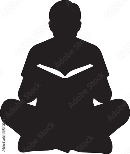 Person sitting cross-legged and reading an open book, symbolizing study and knowledge