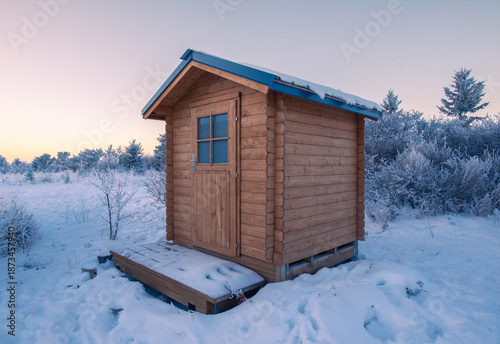 Obraz na płótnie Wooden shed in the winter