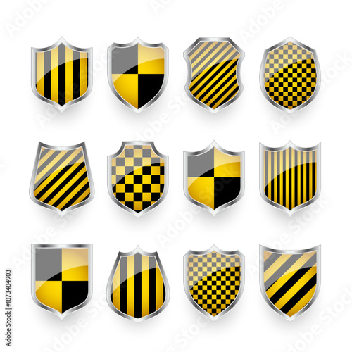 Glossy shields with yellow and black pattern. Security and protection concept. Cyber safety icons, internet privacy, web defense, digital data protection and antivirus themes. Vector illustration