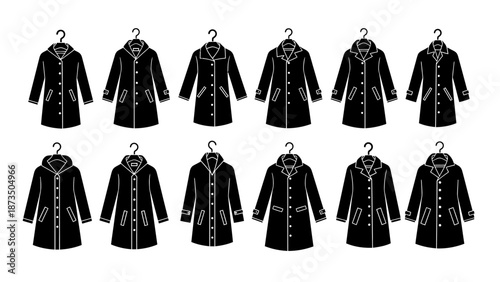 Collection of black trench coats hanging on hangers.