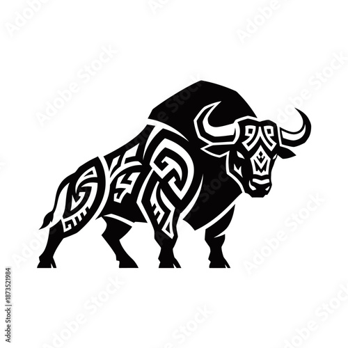 A powerful black bull with intricate tribal patterns adorning its body, standing defiantly with its head lowered.
