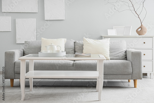 Wallpaper Mural Interior of stylish living room with grey sofa, table and paintings Torontodigital.ca