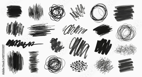 Collection of various black hand drawn brush strokes and scribbles.