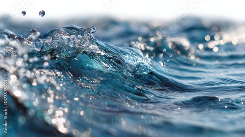 Close-Up View of Blue Waves Splashing with Bokeh Effect in Background