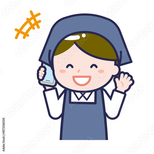 スマートフォンを使う「スタッフ」の男性