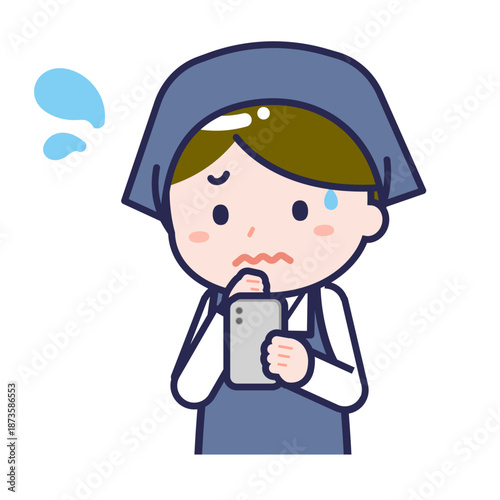 スマートフォンを使う「スタッフ」の男性