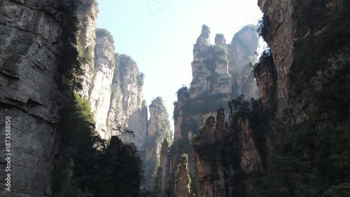 Stunning 4K UHD aerial and time-lapse footage of Zhangjiajie’s Wulingyuan Scenic Area, a world-famous tourist attraction renowned for its dramatic quartz sandstone peaks.