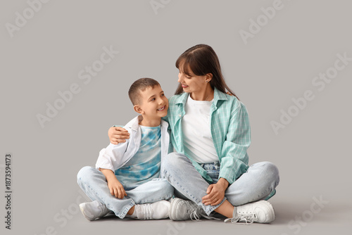 Happy mother hugging her li...