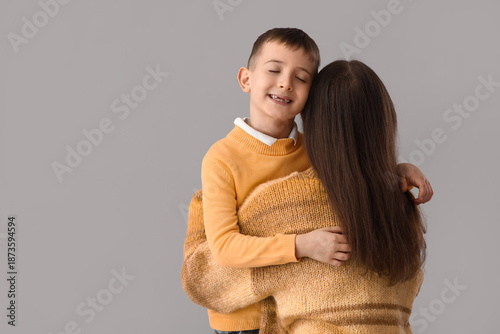Happy little boy with his m...