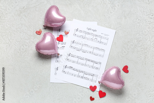 Note sheets with hearts and...