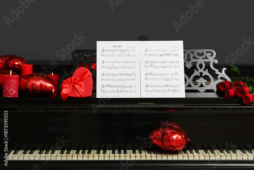 Piano with note sheets, gif...