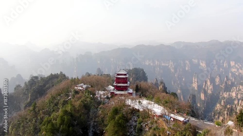 Stunning 4K UHD aerial and time-lapse footage of Zhangjiajie’s Wulingyuan Scenic Area, a world-famous tourist attraction renowned for its dramatic quartz sandstone peaks.