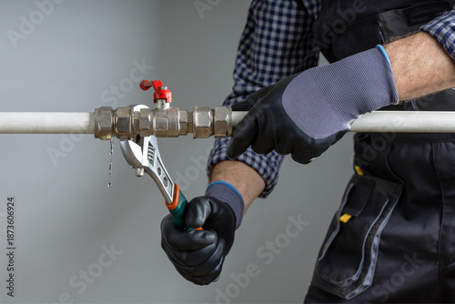 plumber fix leaking pipe at home.