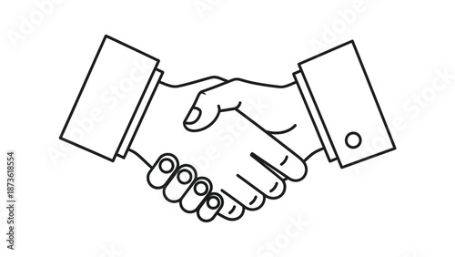 Two business persons in formal attire shake hands firmly over a white background, symbolizing agreement and partnership.