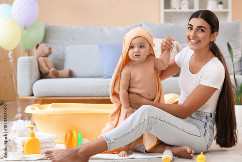 Young woman with her baby i...