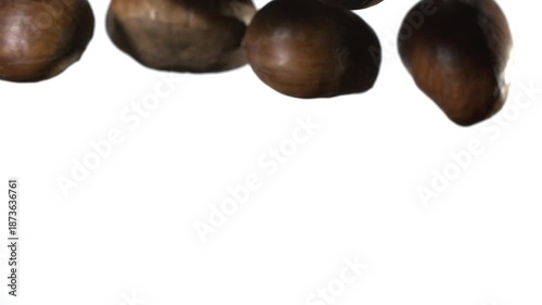 Wallpaper Mural Super slow motion Bulk food package presentation featuring scattered bunch of chestnuts with textured shells Torontodigital.ca