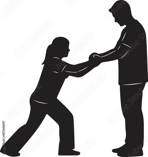 Silhouette of a man and woman pulling hands apart