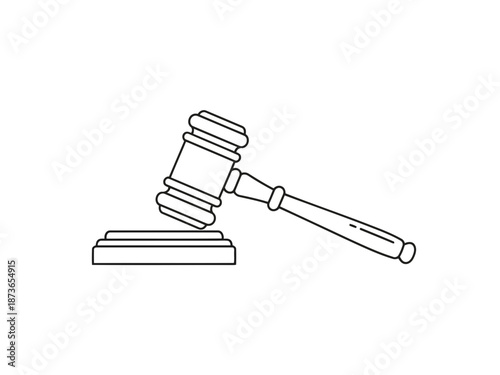 Wooden judge gavel resting on sound block used in legal proceedings