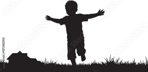 Silhouette of a happy child jumping in the grass