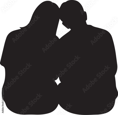 Silhouette of a loving couple embracing and kissing tenderly