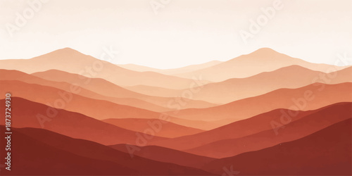 Sunrise mountain landscape with orange mist and fog in the valley under a blue sky