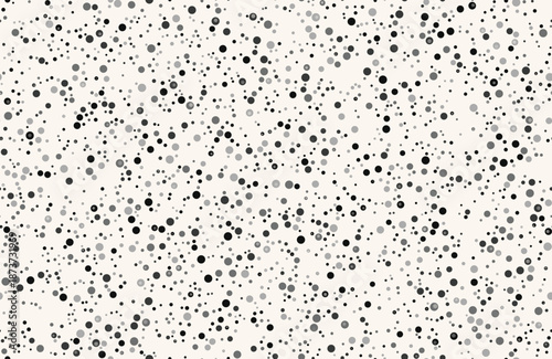 Dense seamless pattern of tiny black and gray dots creating a stippled texture