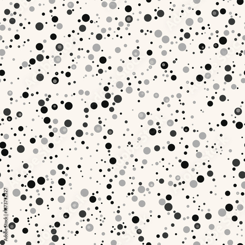 Minimalist Seamless Polka Dot Pattern with Sparse Black and Grey Circles on Cream