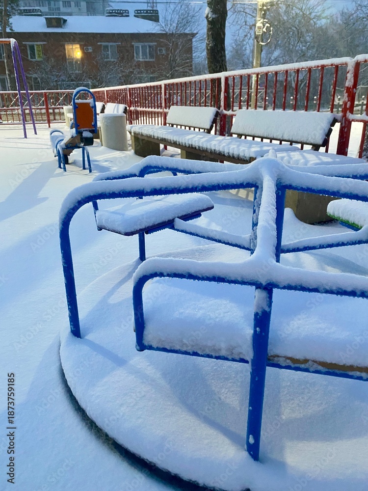 Obraz premium Children playground covered with snow